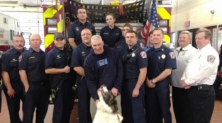 Firefighters Reunite With Dog They Pulled From Frozen Lake